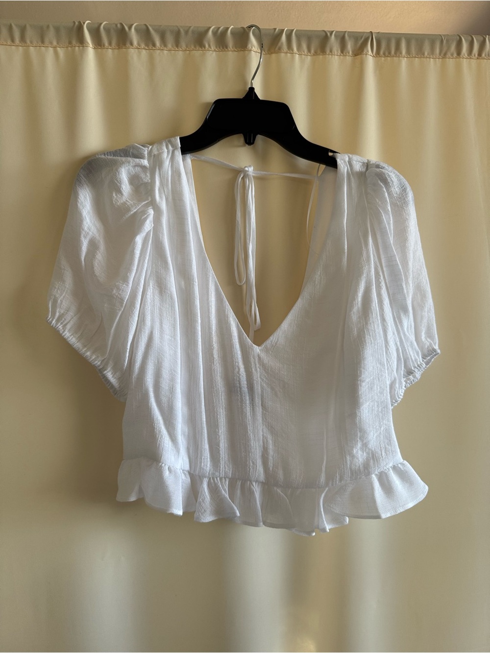 1. State White V-Neck Ruffle Hem Tie-Back Blouse